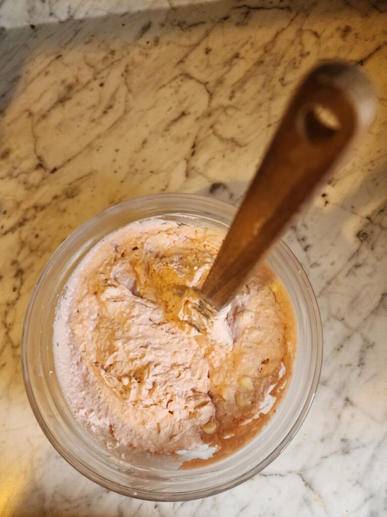 Batter being mixed for strawberry ice cream bread