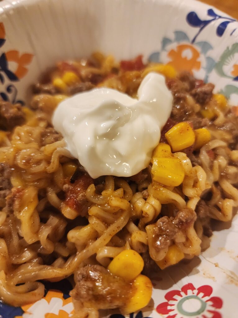 ramen taco skillet served with a dollop of sour cream